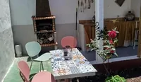 Susa and Pepe garden and house