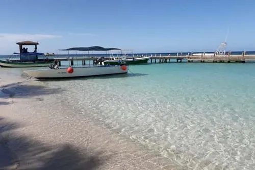 Odpočinek na pláži v West Bay